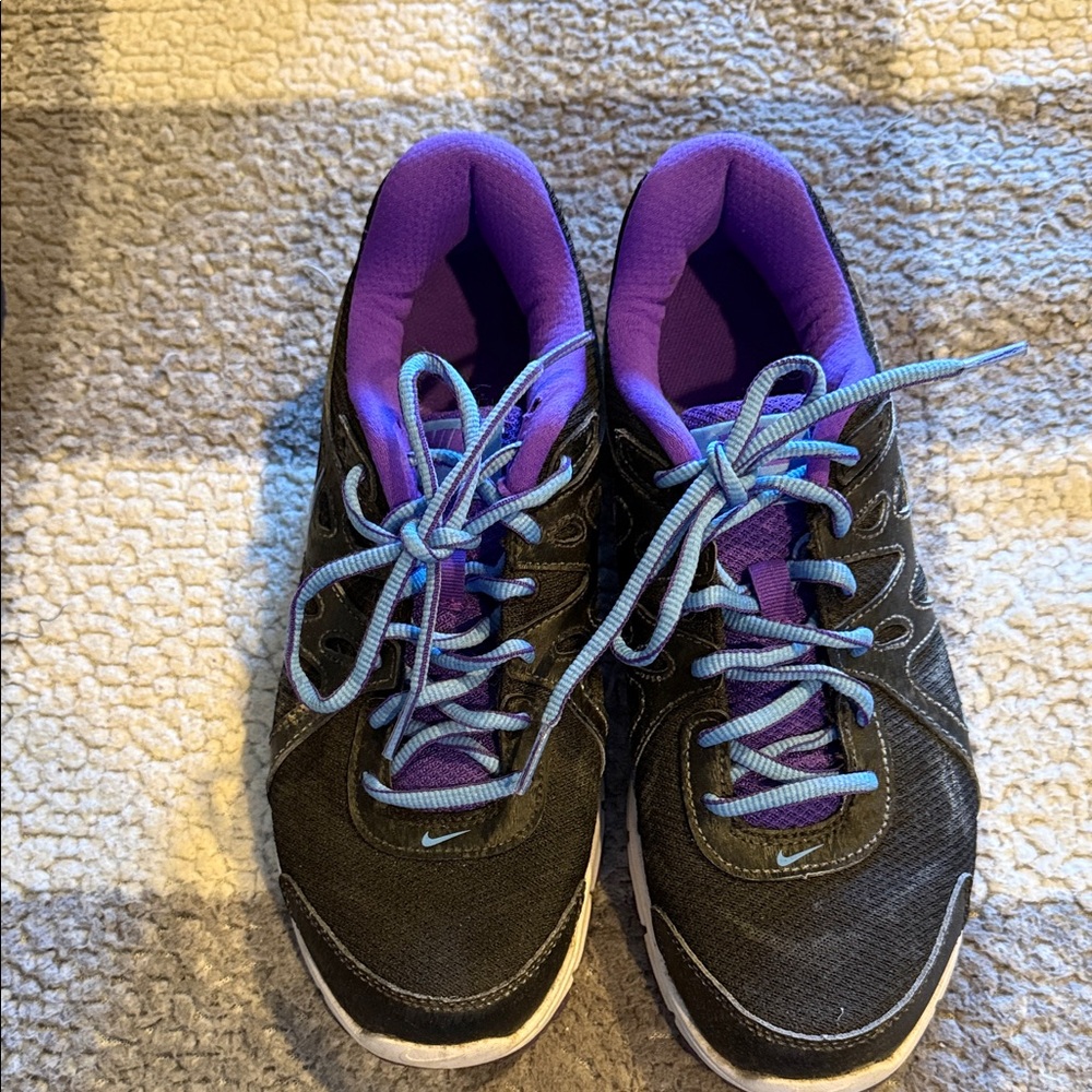 Nike Revolution 2
Women's Black and Purple Athletic Shoes